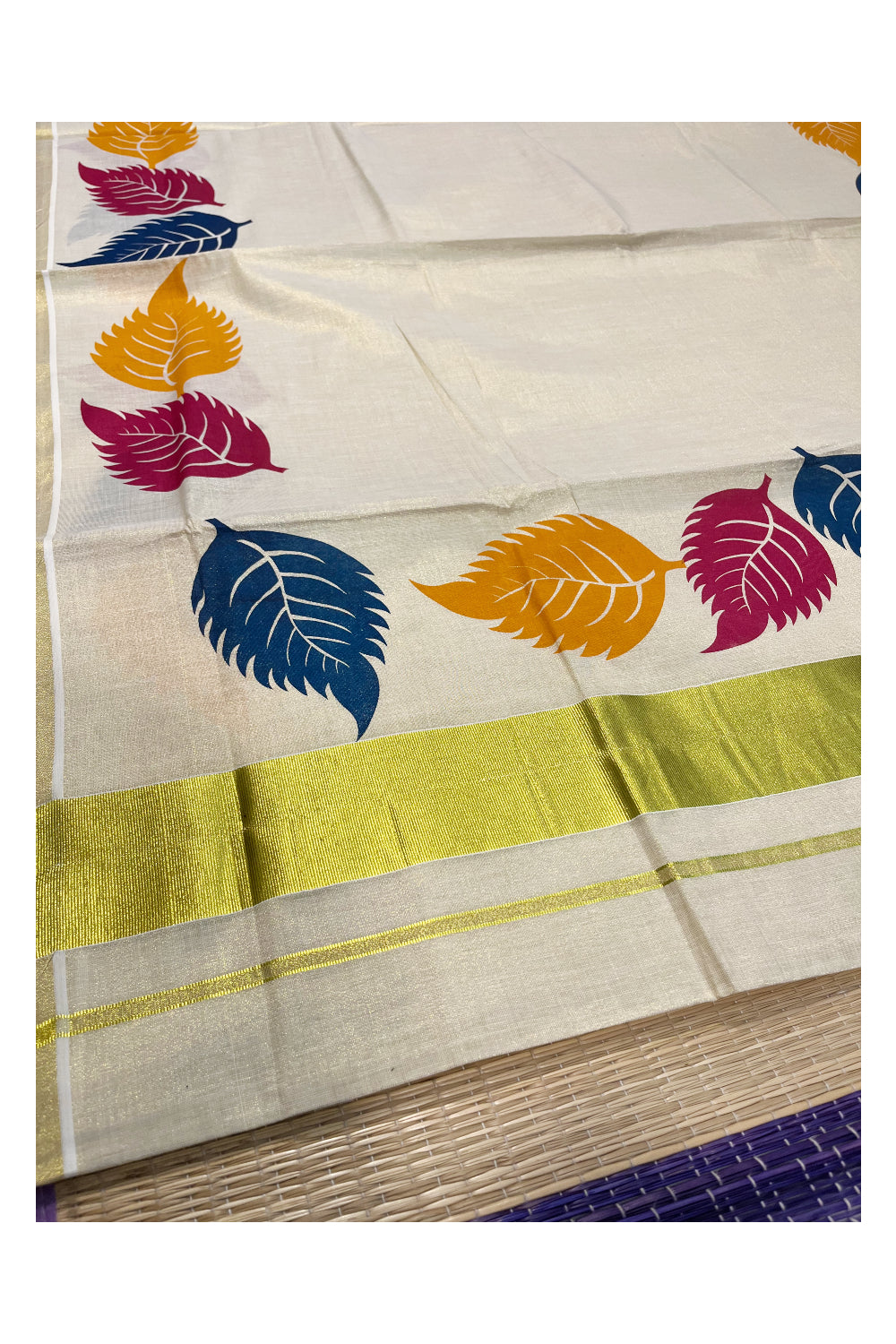 Kerala Tissue Saree with Vibrant Colour Big Leaf Designs on Border