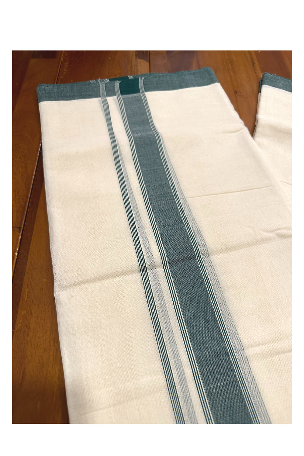 Southloom Premium Handloom Mundu with Green Kara (Onam Mundu 2023)