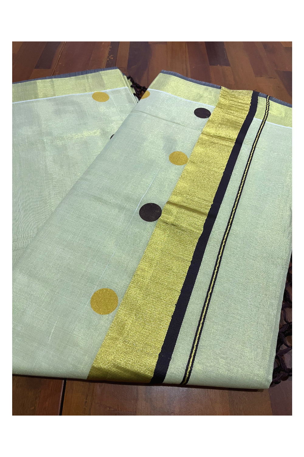 Kerala Tissue Kasavu Saree with Brown and Golden Polka Prints and Tassels Works