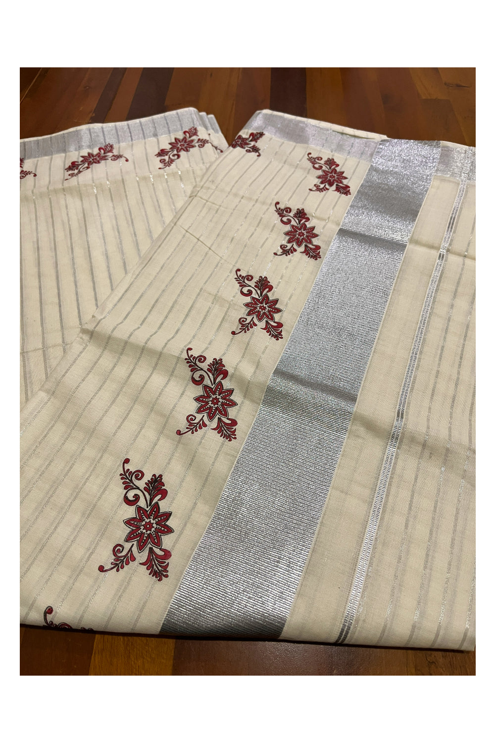 Pure Cotton Kerala Saree with Silver Lines and Red Floral Block Prints on Border