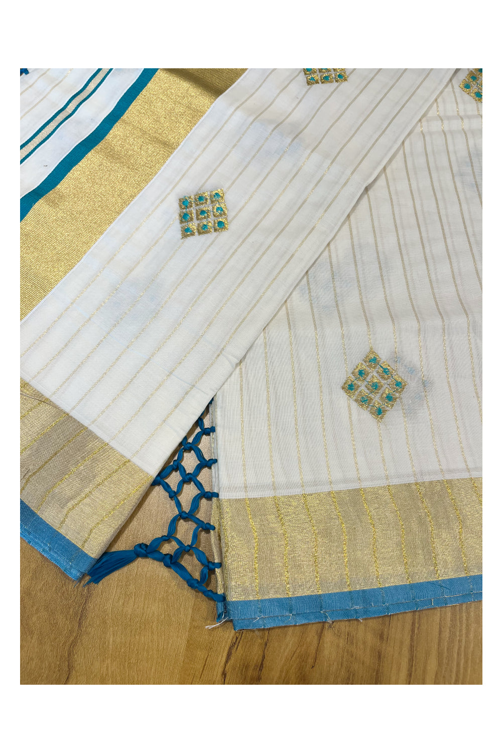 Kerala Cotton Kasavu Stripes Saree with Peacock Green Floral Embroidery Design on Body