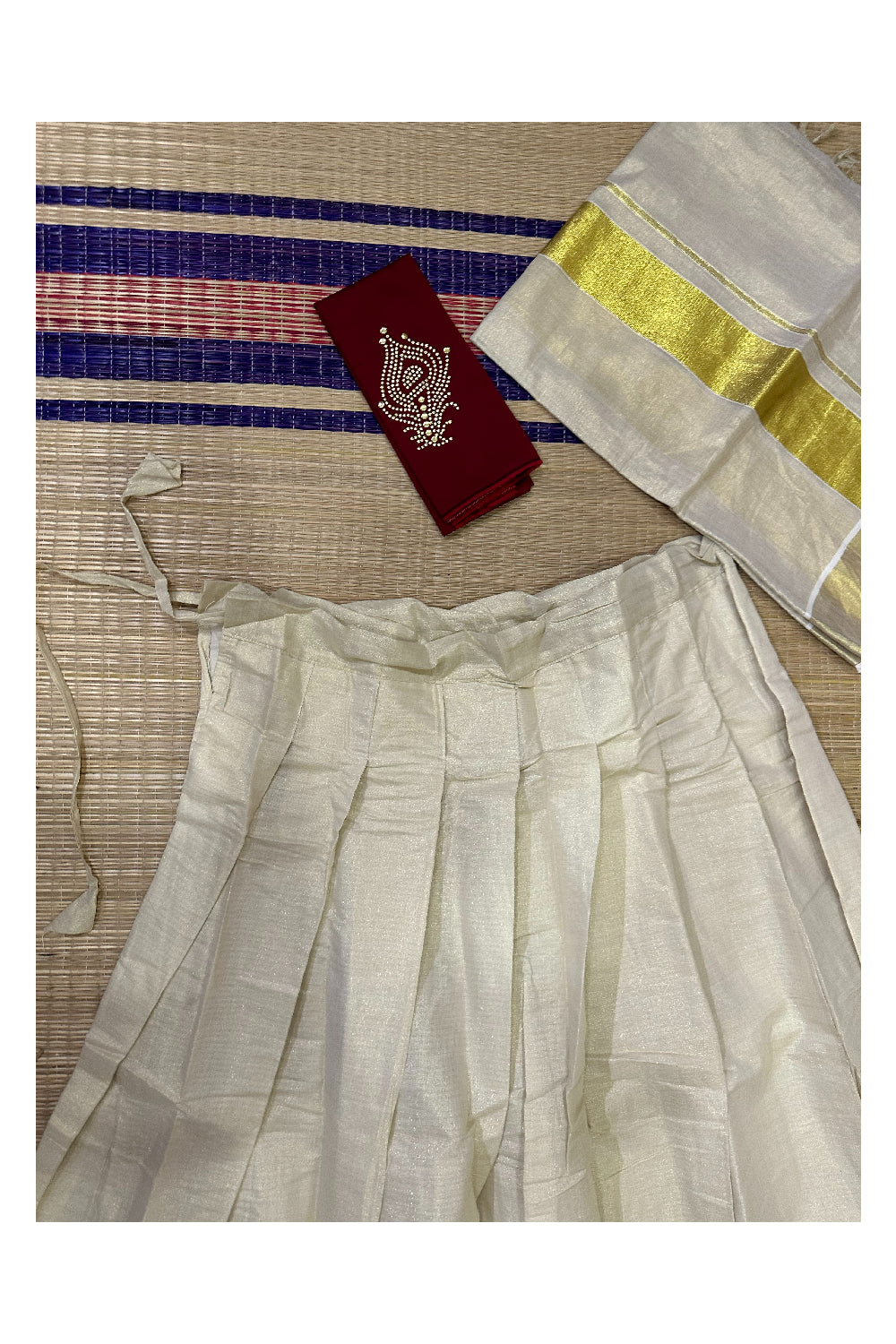 Semi Stitched Dhavani Set with Tissue Pavada and Maroon Bead Work Blouse Piece