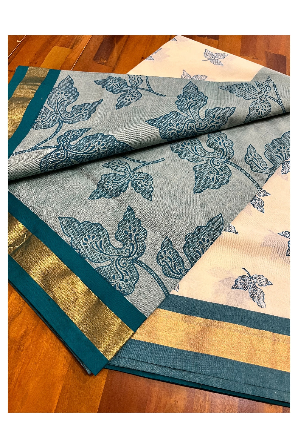 Pure Cotton Kerala Saree with Teal Block Print Leaf Designs and Kasavu Border (Vishu 2024 Collection)