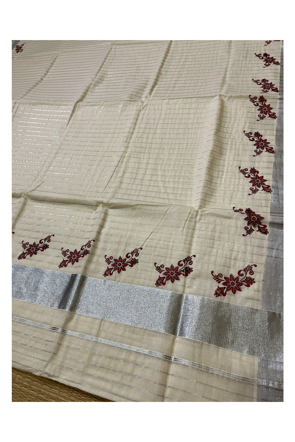 Pure Cotton Kerala Saree with Silver Lines and Red Floral Block Prints on Border