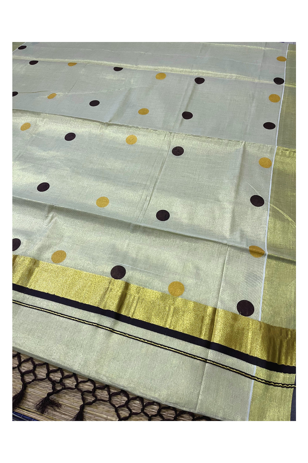 Kerala Tissue Kasavu Saree with Brown and Golden Polka Prints and Tassels Works