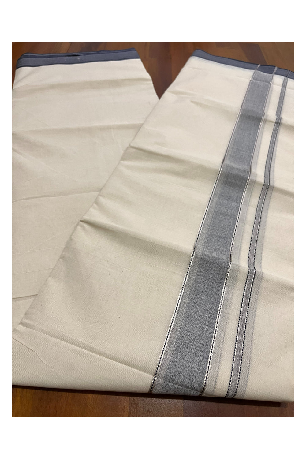 Pure Cotton 100x100 Double Mundu with Silver Kasavu and Blue Kara (Onam Mundu 2023)