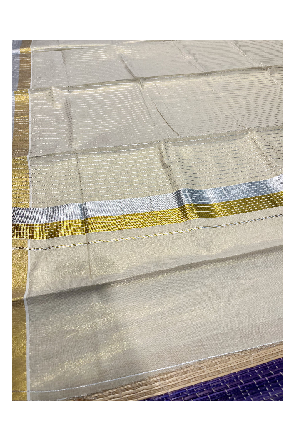 Kerala Tissue Kasavu Saree with Silver Lines Design on Body