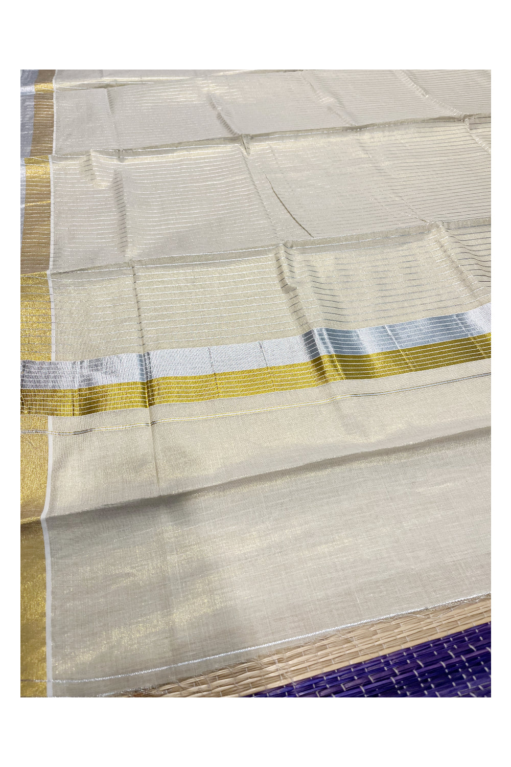 Kerala Tissue Kasavu Saree with Silver Lines Design on Body