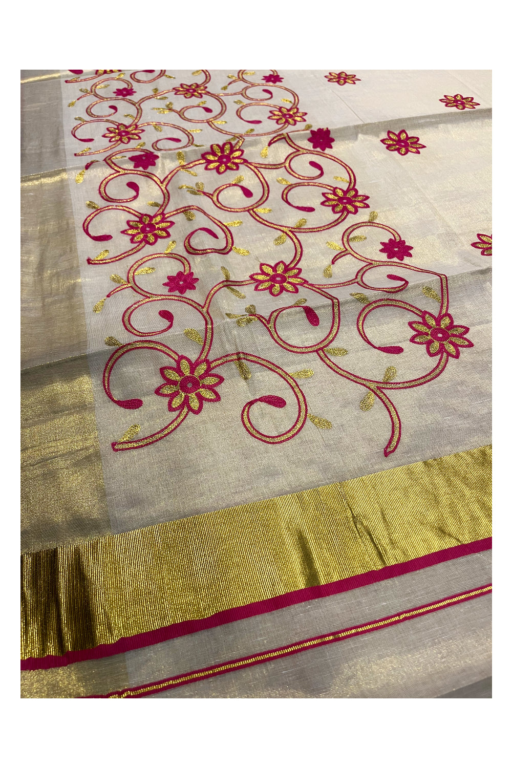 Kerala Tissue Kasavu Saree With Pink and Golden Floral Embroidery Works