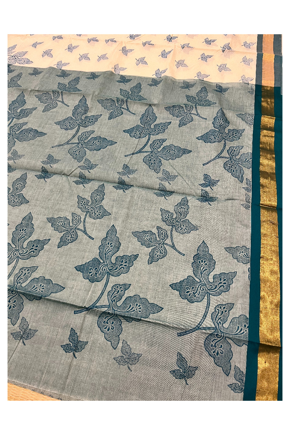 Pure Cotton Kerala Saree with Teal Block Print Leaf Designs and Kasavu Border (Vishu 2024 Collection)