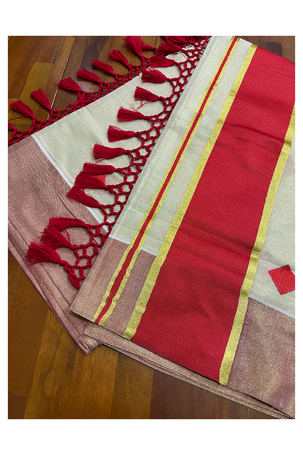Kerala Tissue Kasavu Saree with Red Gold Woven Butta Designs and Tassels Works