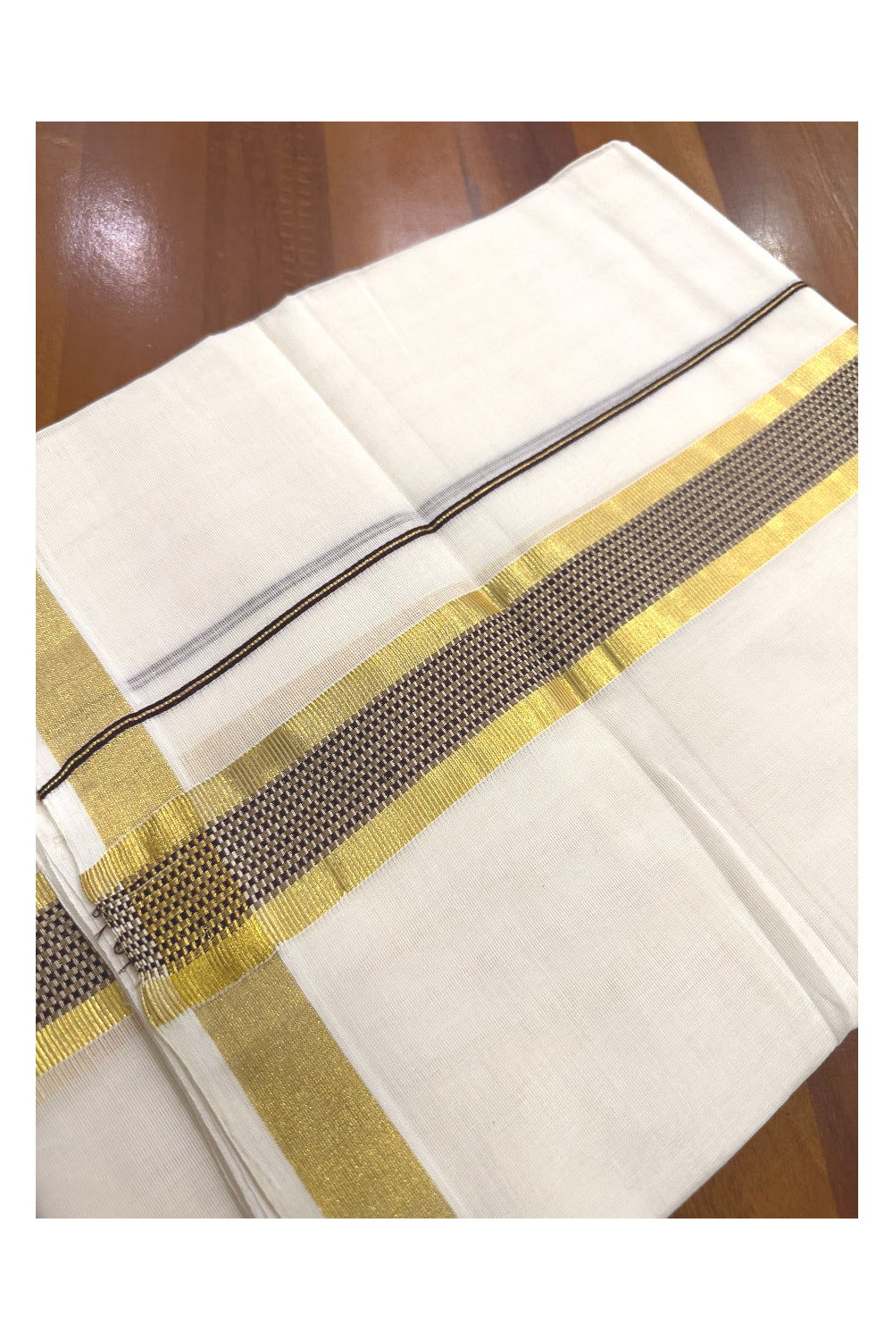 Southloom Premium Handloom Mundu with Brown and Design Kasavu Kara (Onam Mundu 2023)