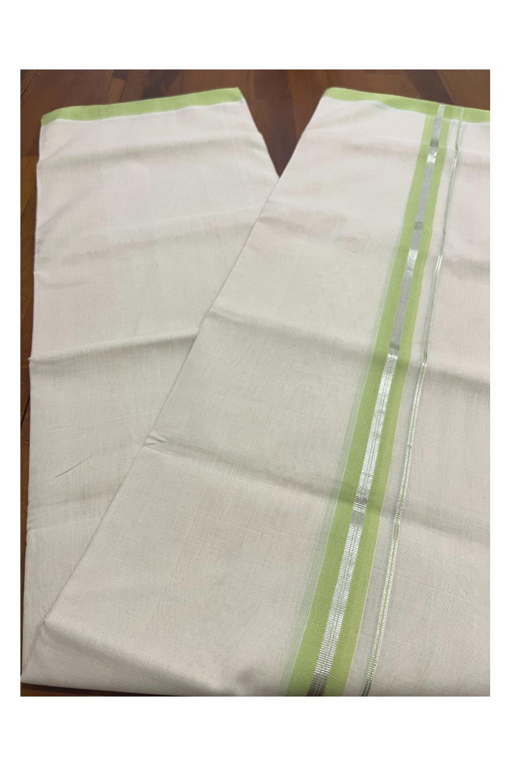 Southloom Premium Balaramapuram Unakkupaavu Handloom Mundu with Light Green and Silver Kasavu Border (South Indian Kerala Dhoti)