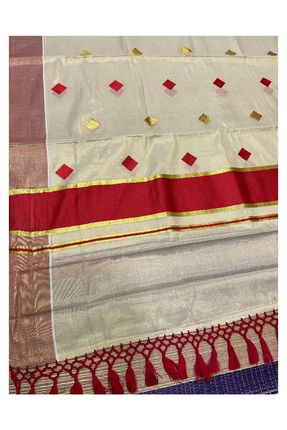 Kerala Tissue Kasavu Saree with Red Gold Woven Butta Designs and Tassels Works