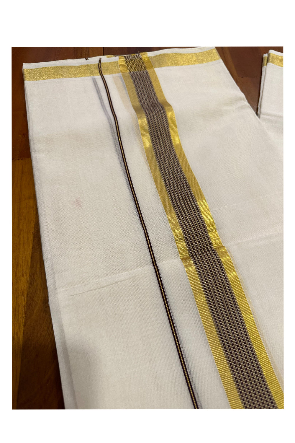 Southloom Premium Handloom Mundu with Brown and Design Kasavu Kara (Onam Mundu 2023)