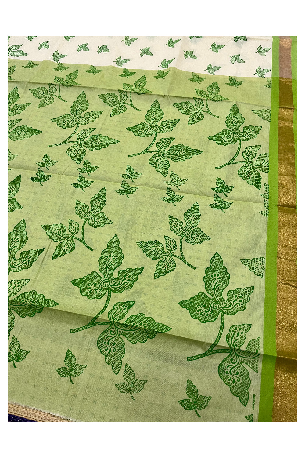 Pure Cotton Kerala Saree with Light Green Block Print Leaf Designs and Kasavu Border (Vishu 2024 Collection)