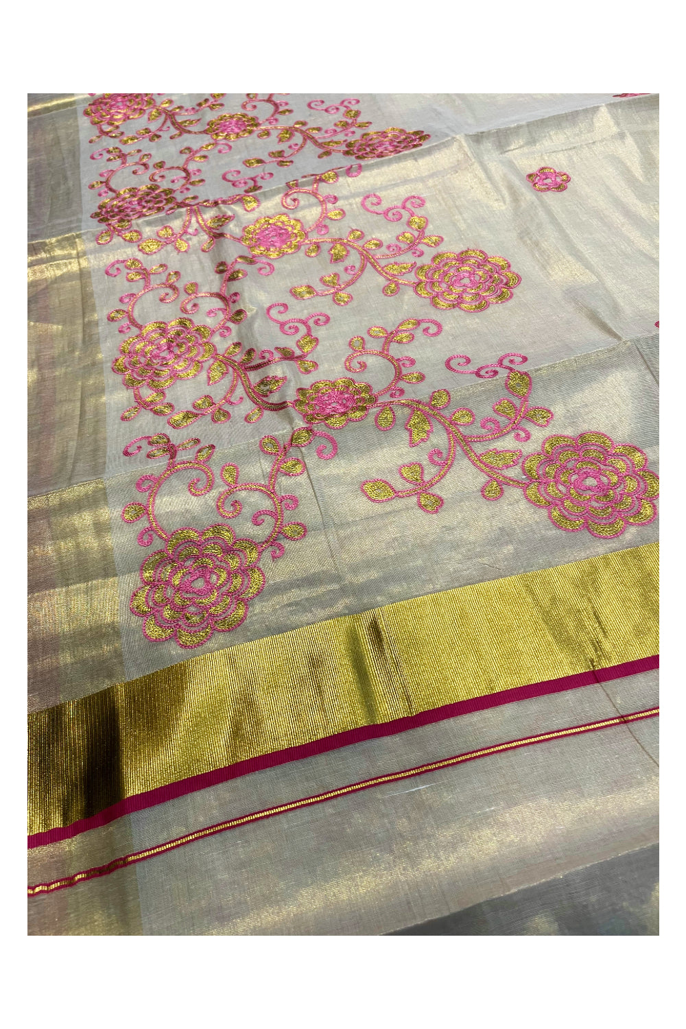 Kerala Tissue Kasavu Saree With Pink and Golden Floral Embroidery Works