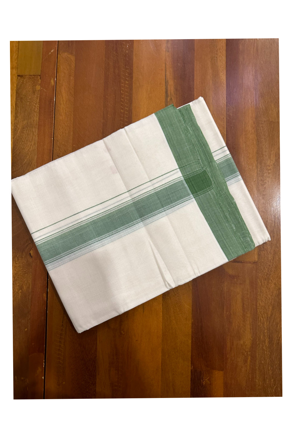 Southloom Premium Handloom Mundu with Green Kara (Onam Mundu 2023)