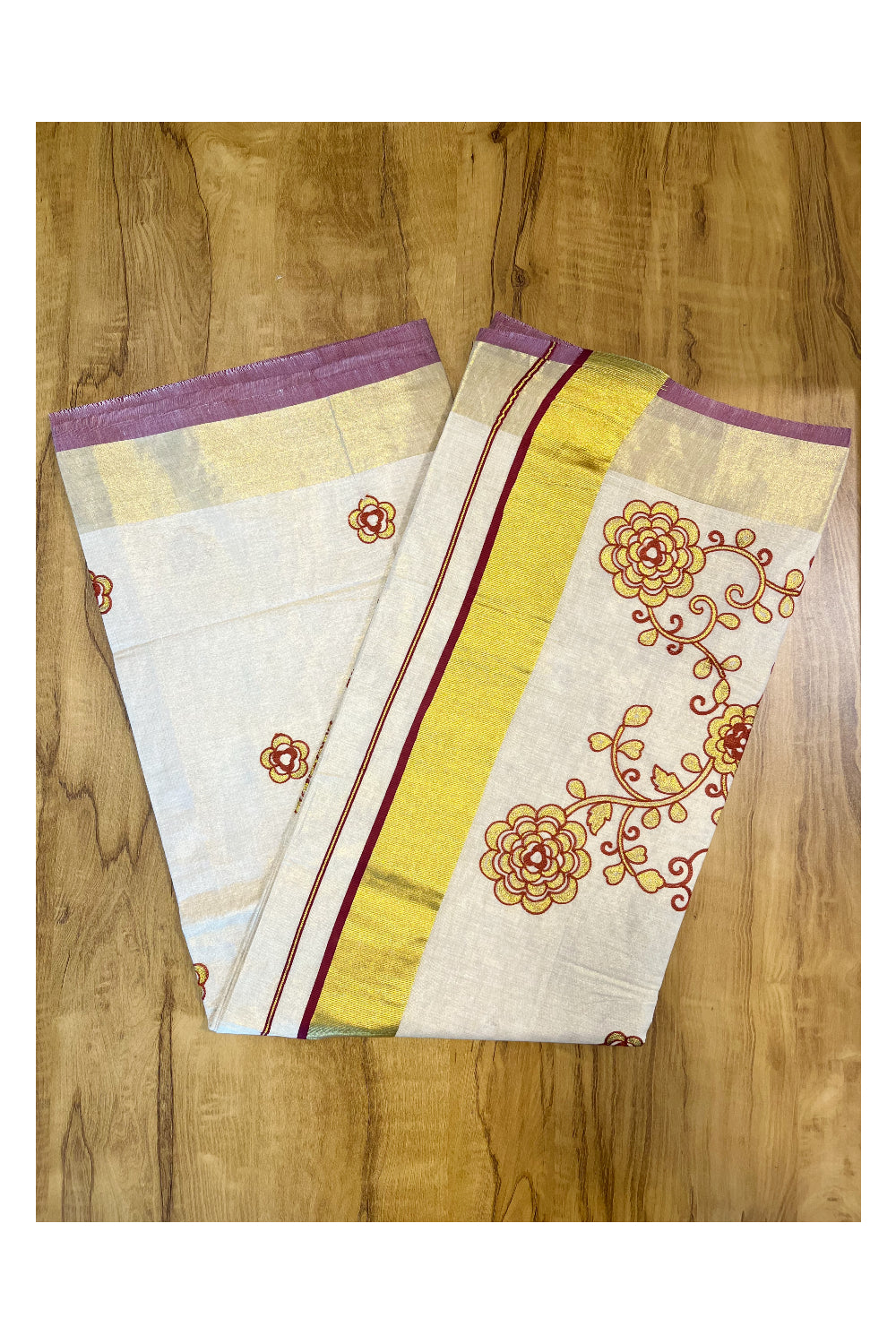 Kerala Tissue Kasavu Saree With Brown and Golden Floral Embroidery Works