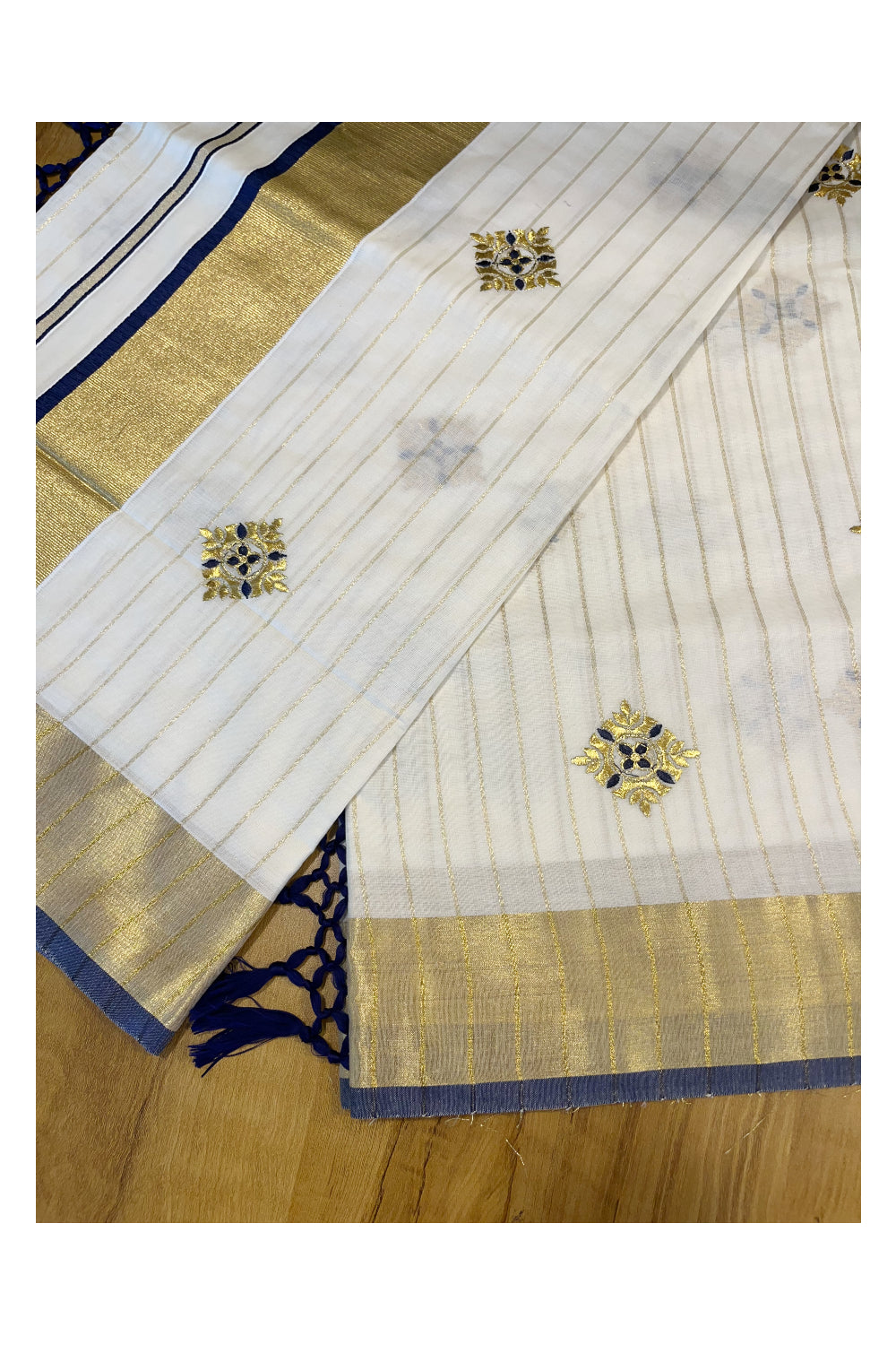 Kerala Cotton Kasavu Lines Saree with Blue and Golden Floral Embroidery Work