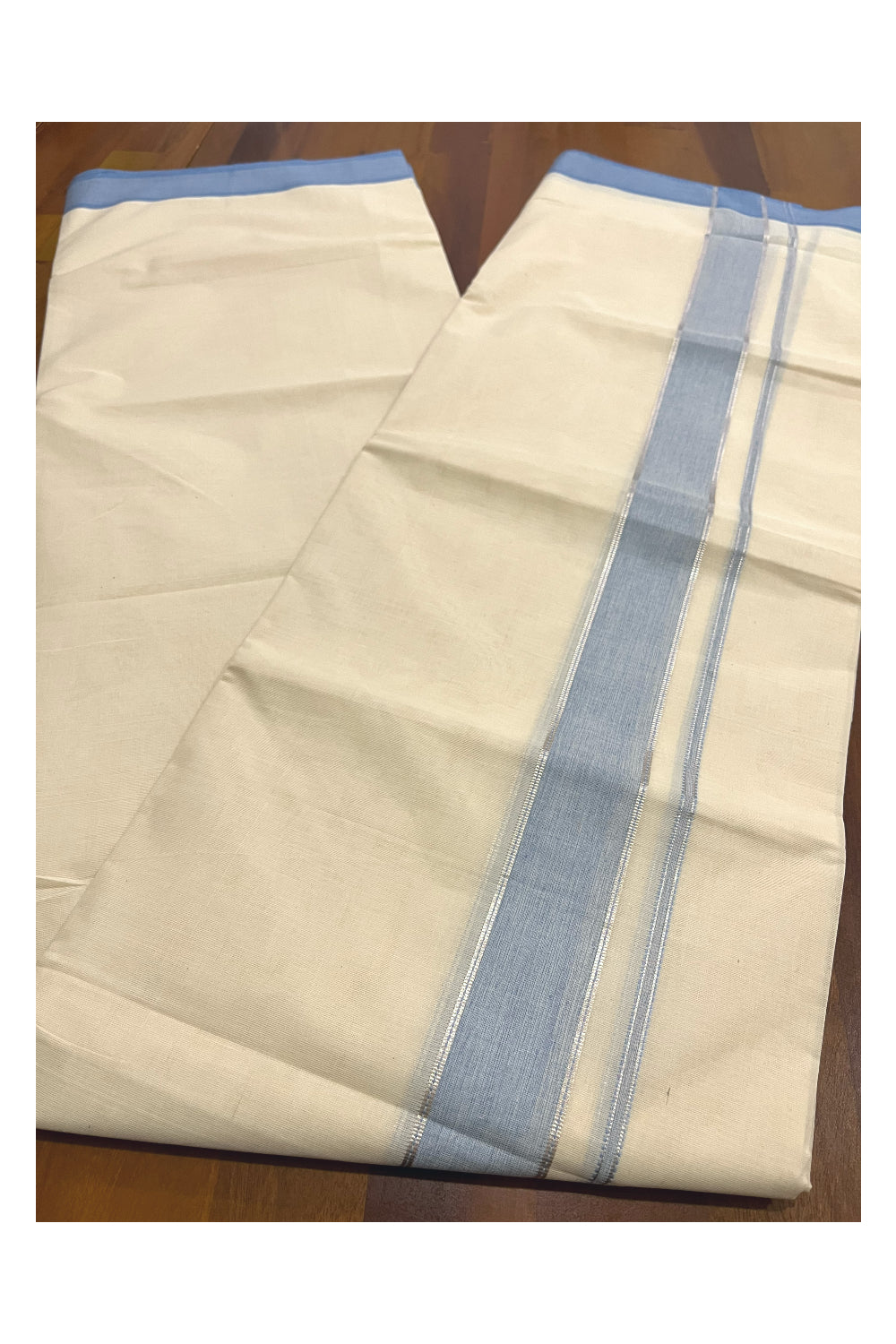 Pure Cotton 100x100 Double Mundu with Silver Kasavu and Blue Kara (Onam Mundu 2023)