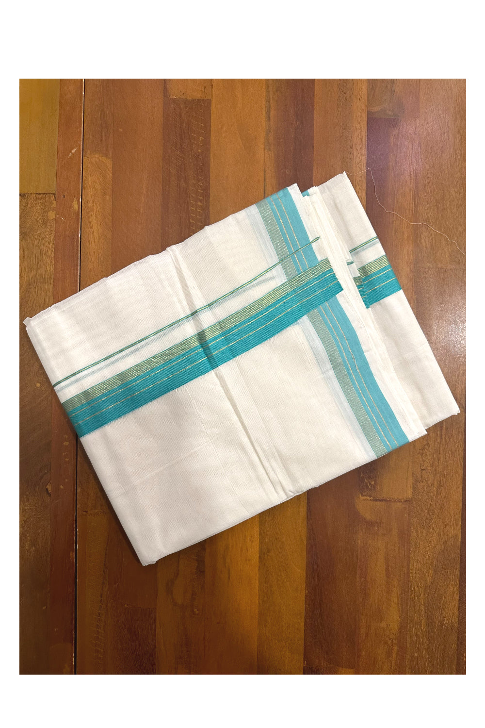 Southloom Premium Handloom Mundu with Turquoise and Kasavu Kara (Onam Mundu 2023)