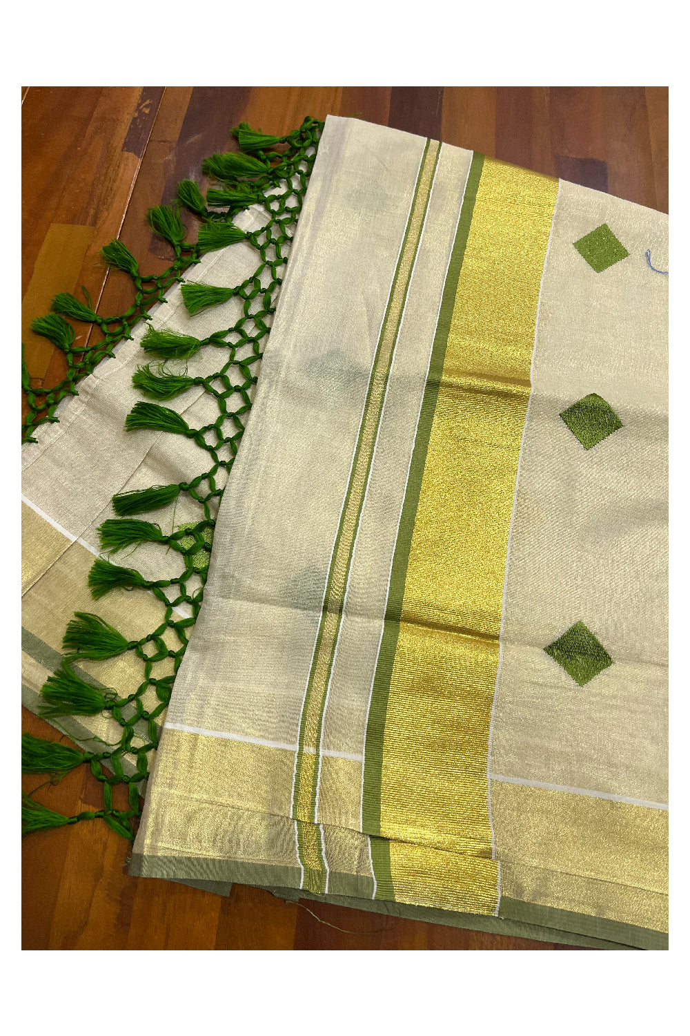 Kerala Tissue Kasavu Saree with Light Green Gold Woven Butta Designs and Tassels Works (Vishu 2024 Collection)