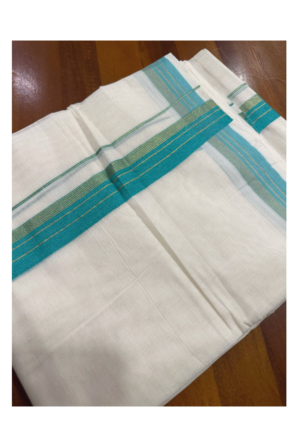 Southloom Premium Handloom Mundu with Turquoise and Kasavu Kara (Onam Mundu 2023)