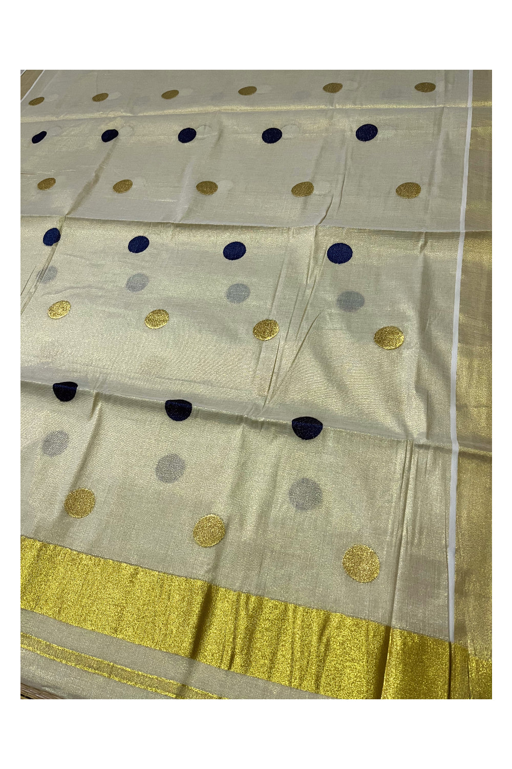 Kerala Tissue Kasavu Saree with Navy Blue Polka Woven Designs