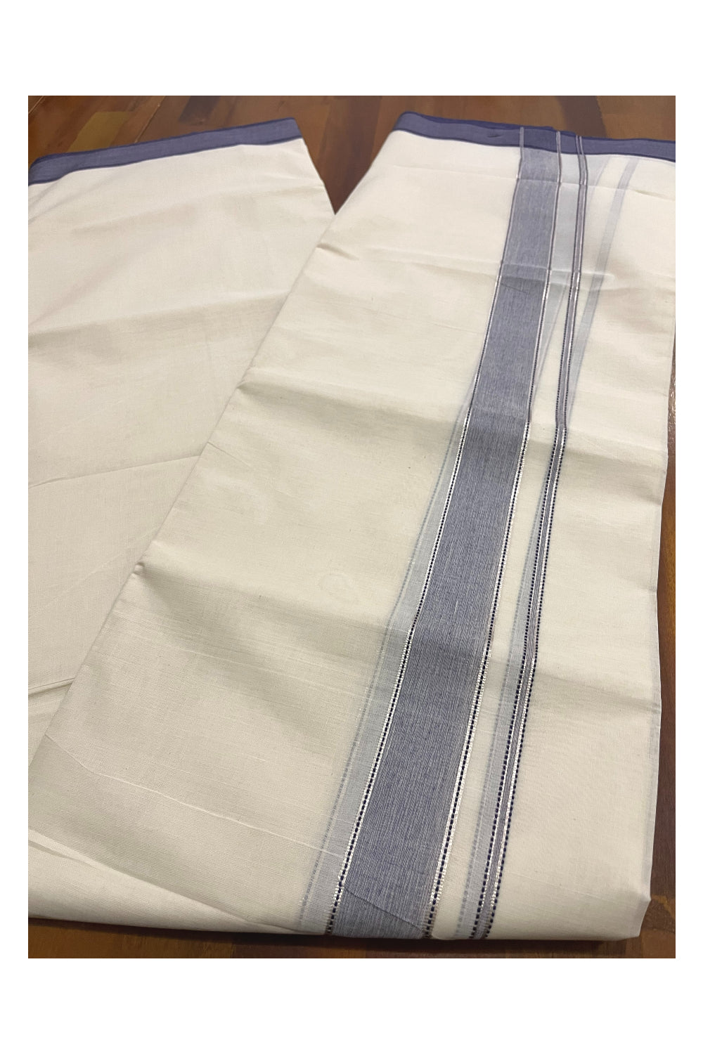 Pure Cotton 100x100 Double Mundu with Silver Kasavu and Blue Kara (Onam Mundu 2023)