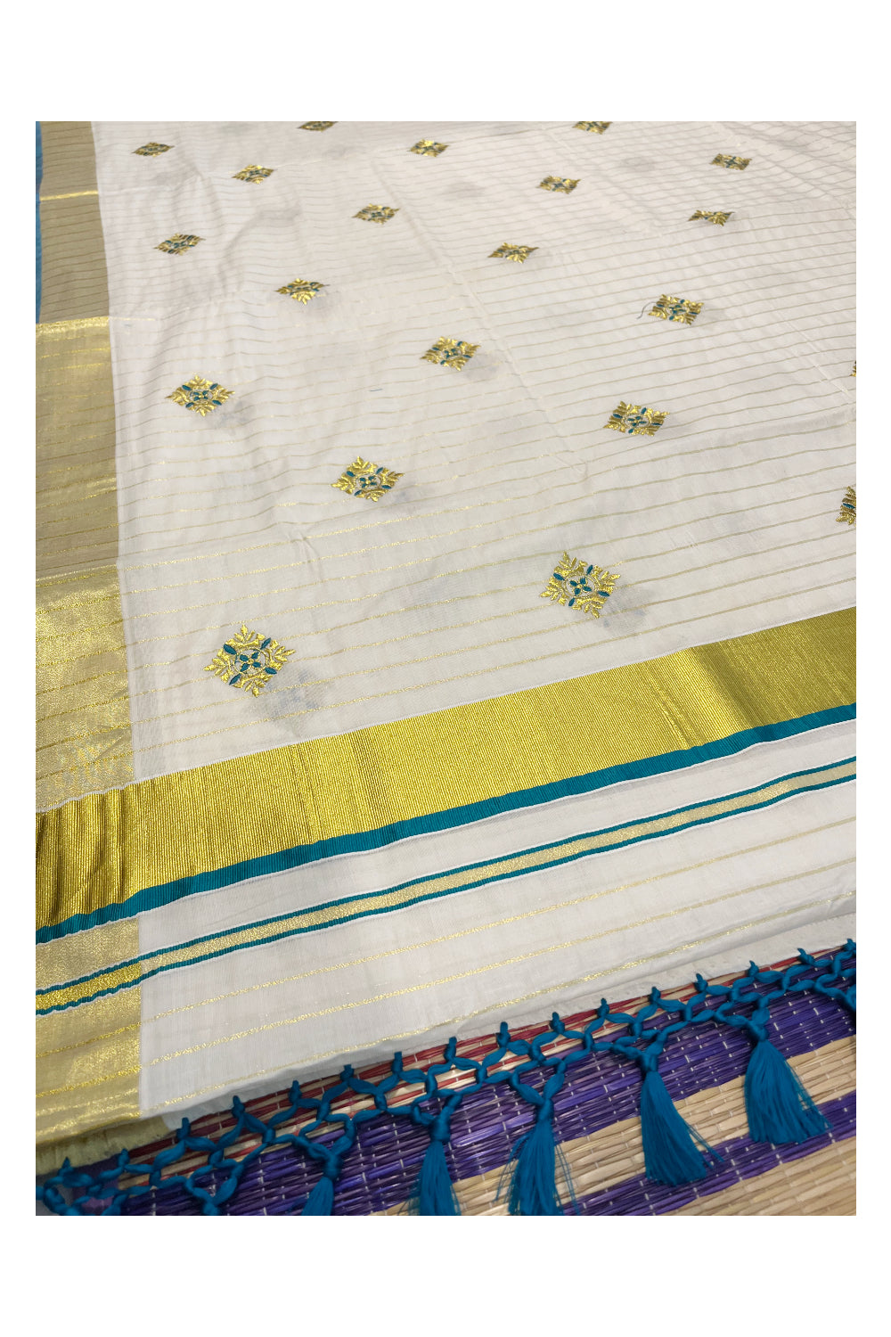 Kerala Cotton Kasavu Lines Saree with Peacock Green and Golden Floral Embroidery Work