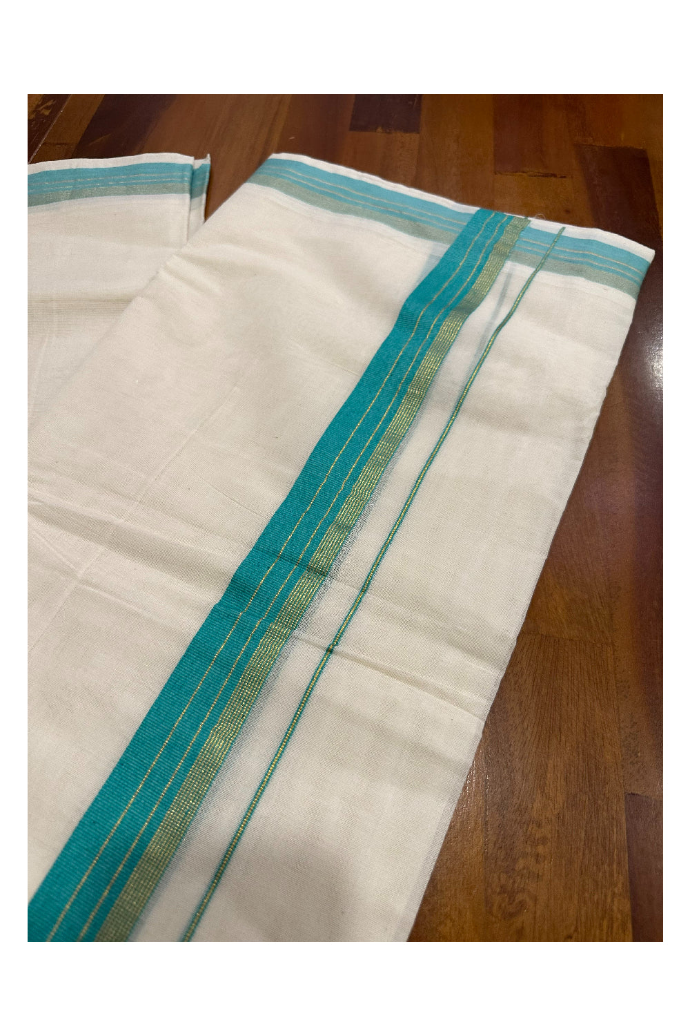 Southloom Premium Handloom Mundu with Turquoise and Kasavu Kara (Onam Mundu 2023)