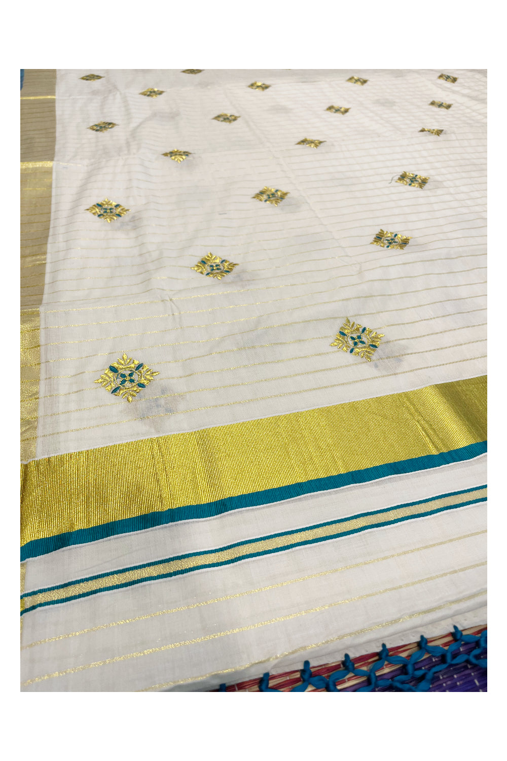 Kerala Cotton Kasavu Lines Saree with Peacock Green and Golden Floral Embroidery Work