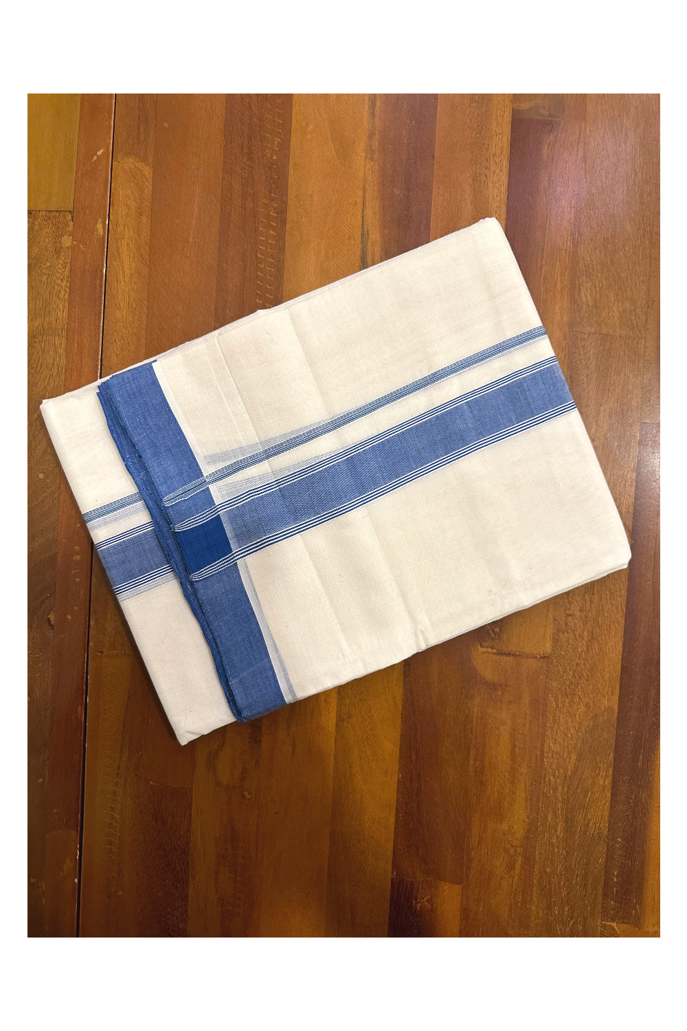 Southloom Premium Handloom Mundu with Blue Kara (Onam Mundu 2023)