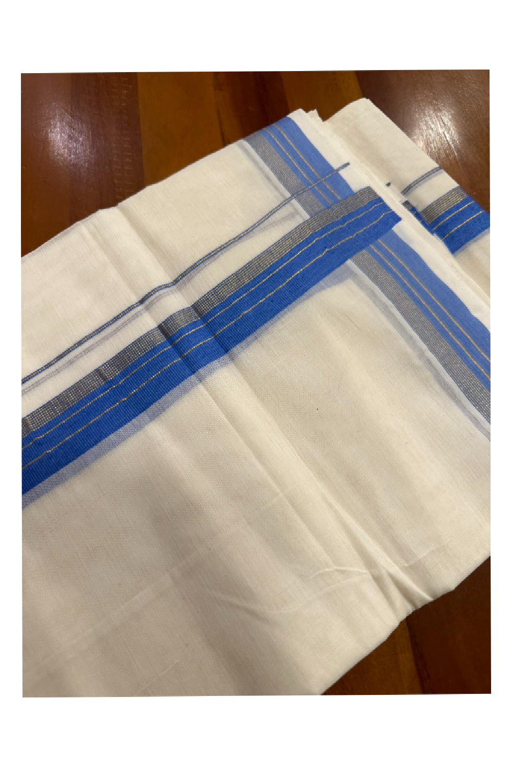 Southloom Premium Handloom Mundu with Blue and Kasavu Kara (Onam Mundu 2023)