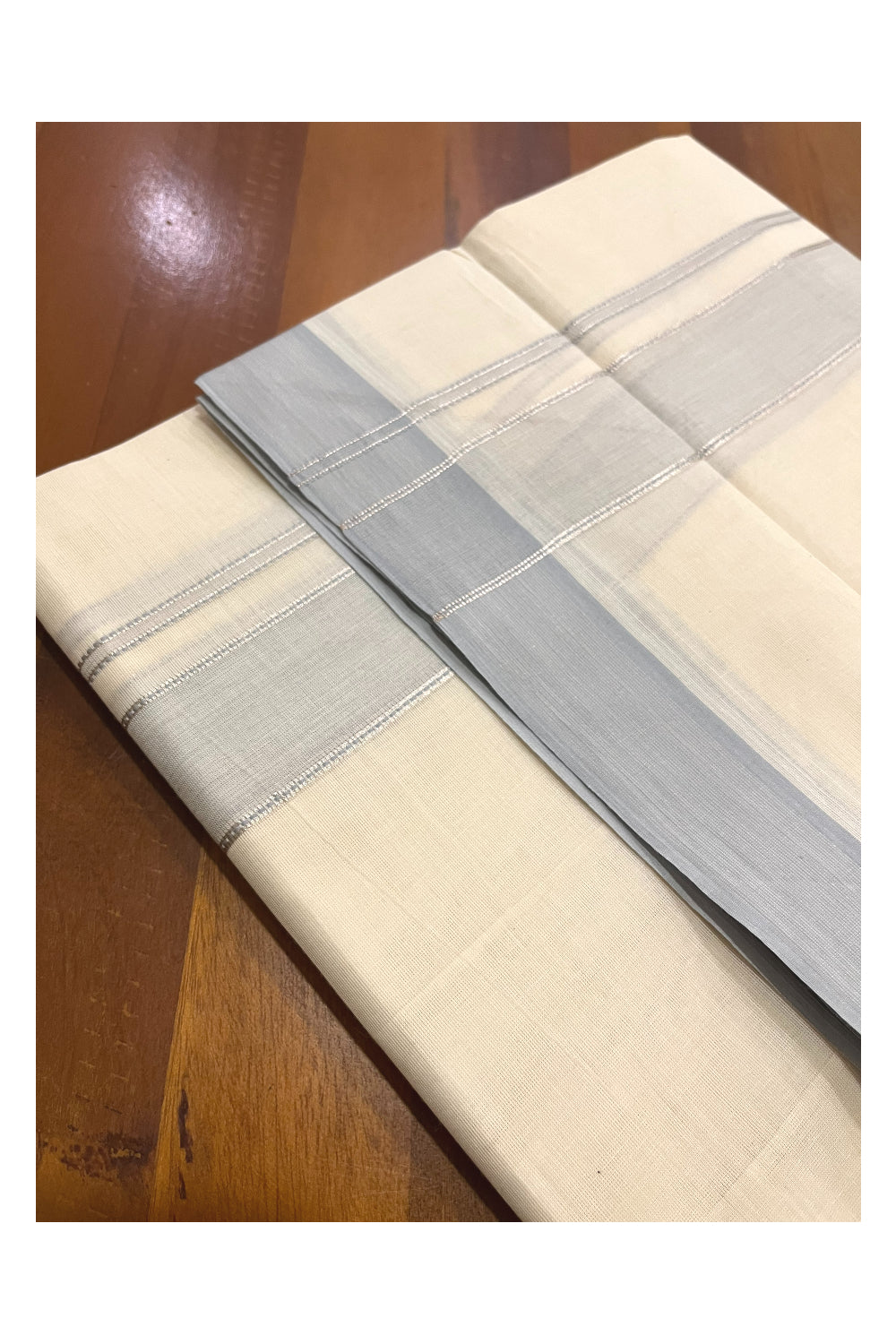 Pure Cotton 100x100 Double Mundu with Silver Kasavu and Pastel Blue Kara (Onam Mundu 2023)