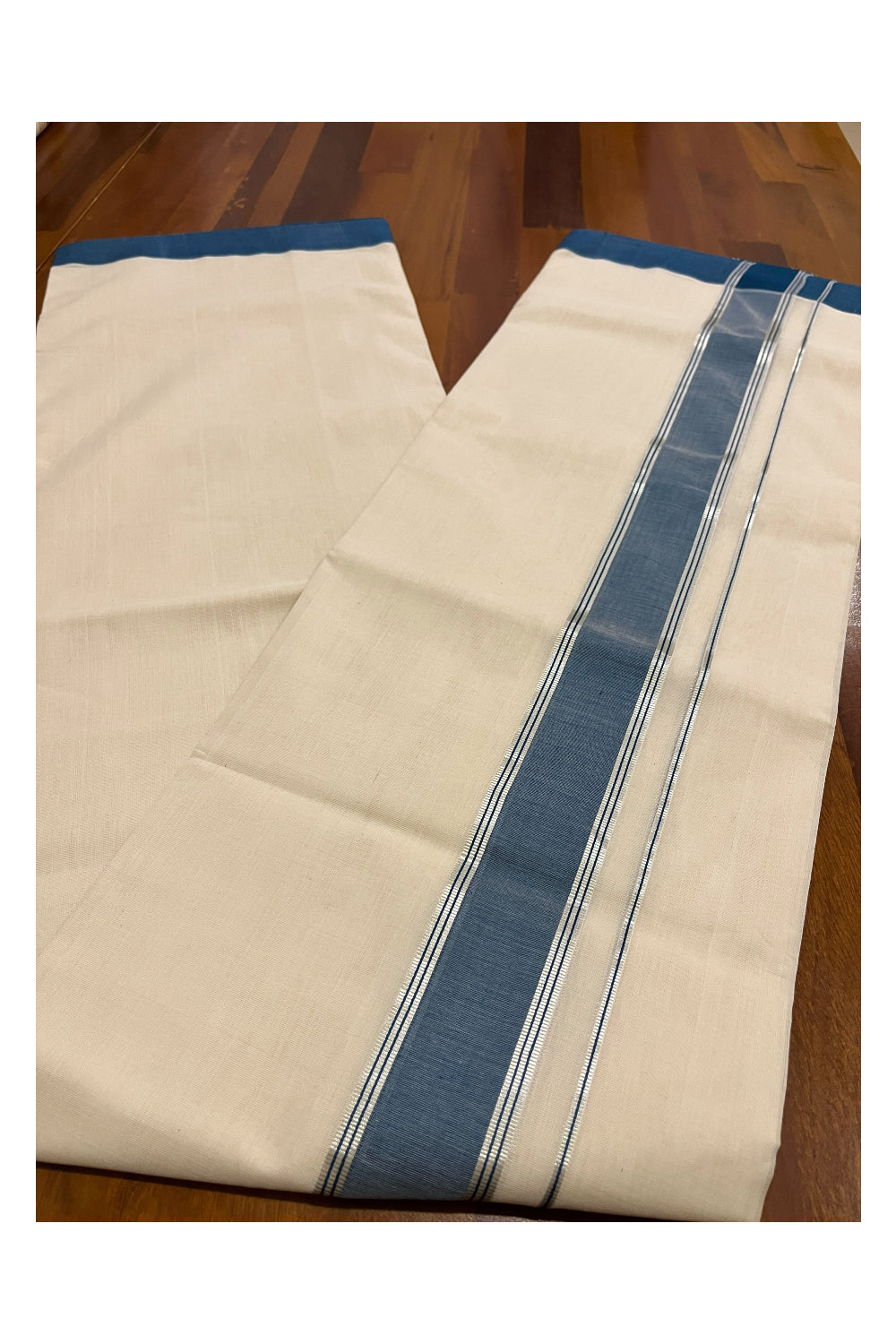 Southloom Premium Balaramapuram Unakkupaavu Handloom Mundu with Blue and Silver Kasavu Border (South Indian Kerala Dhoti)