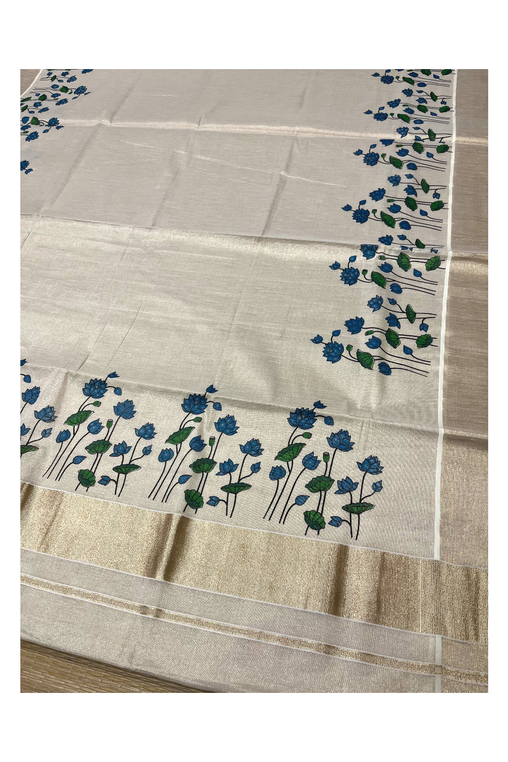 Southloom Antique Gold Tissue Saree with Subtle Blue Lotus Prints