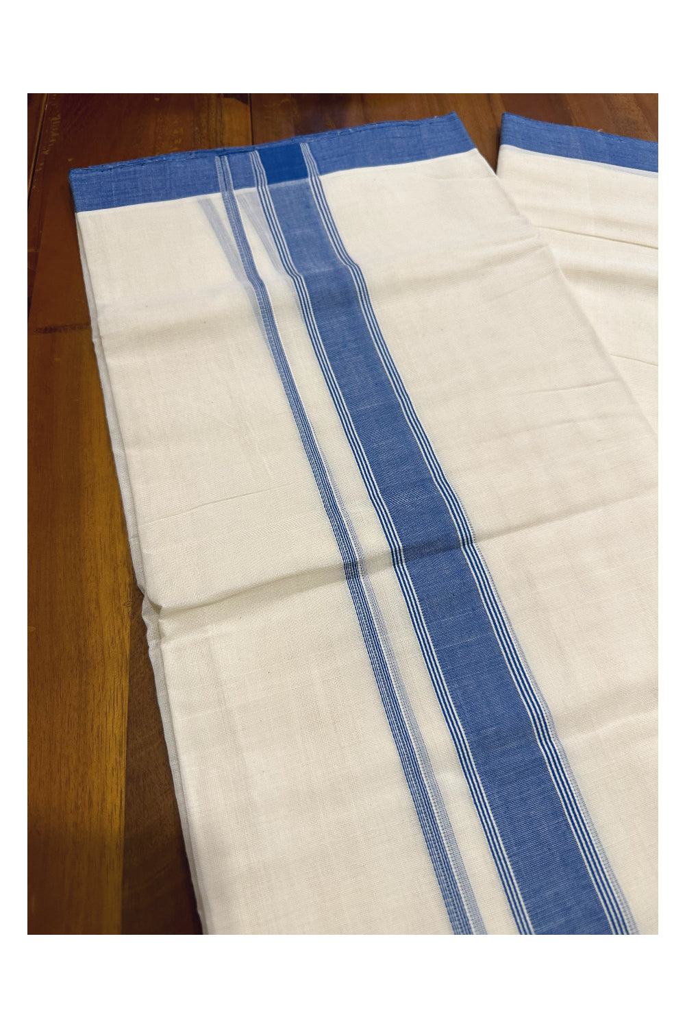 Southloom Premium Handloom Mundu with Blue Kara (Onam Mundu 2023)