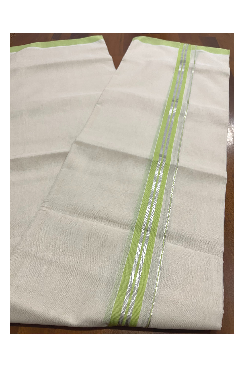 Southloom Premium Balaramapuram Unakkupaavu Handloom Mundu with Light Green and Silver Kasavu Border (South Indian Kerala Dhoti)