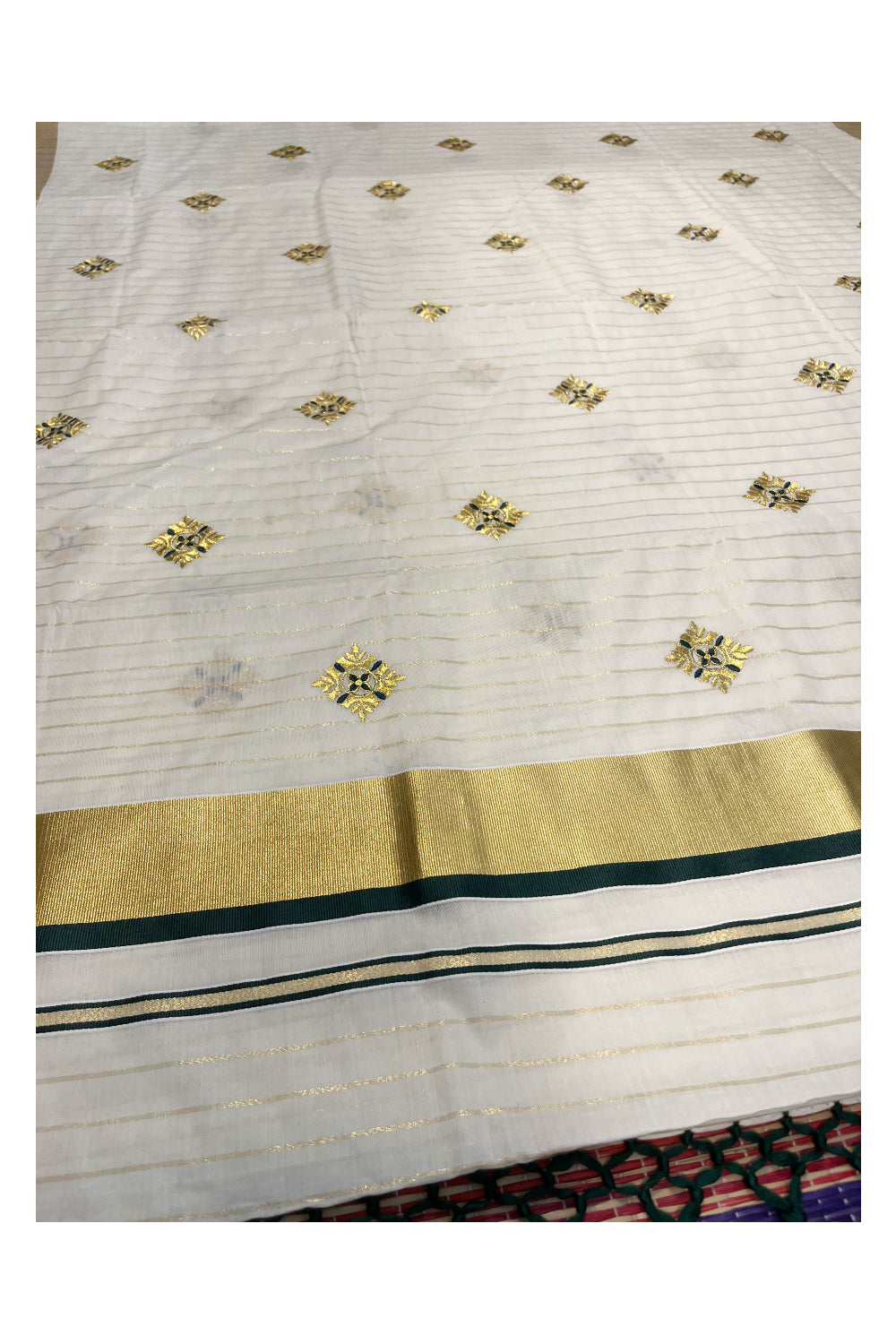 Kerala Cotton Kasavu Lines Saree with Green and Golden Floral Embroidery Work