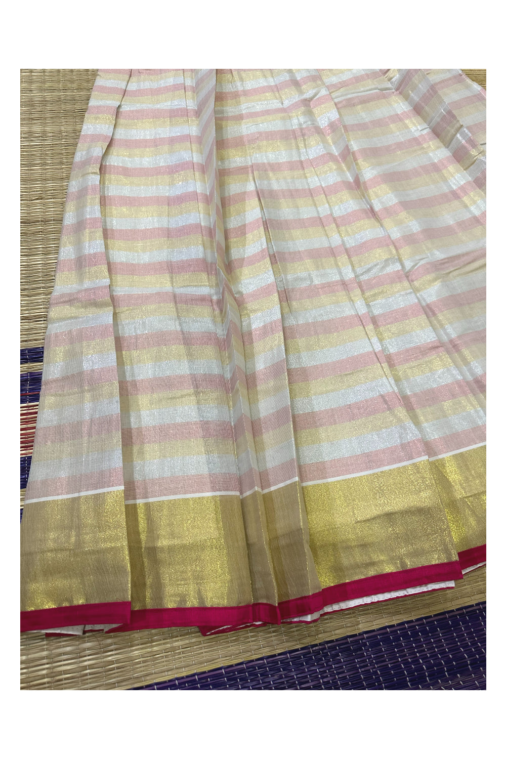 Semi Stitched Dhavani Set with Pink and Kasavu Lines Design Pavada and Blouse Piece