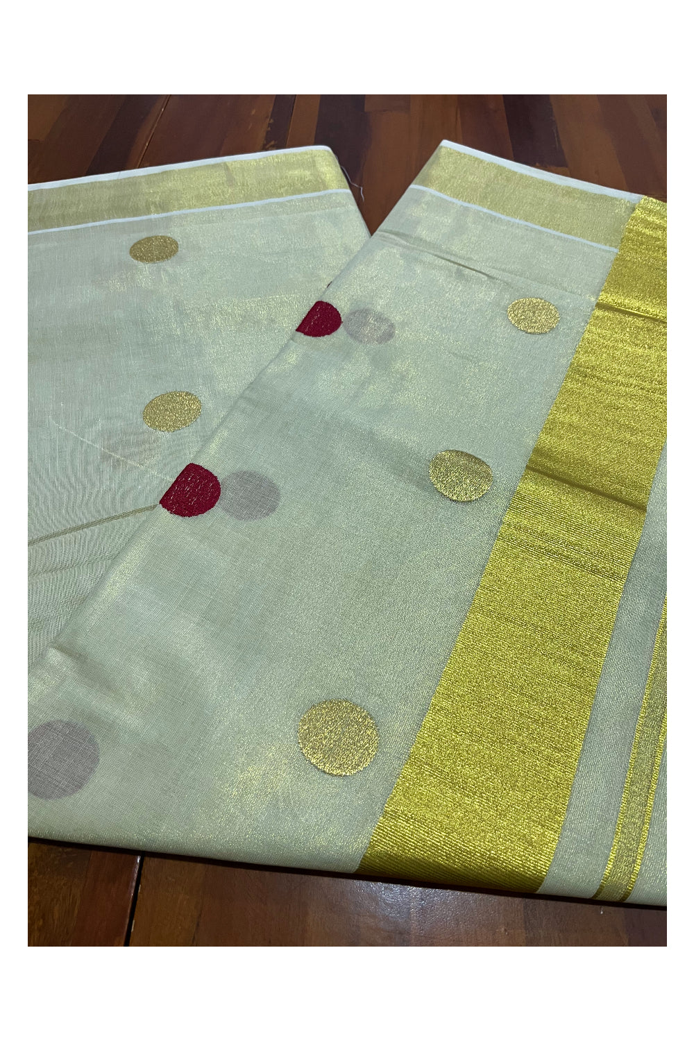 Kerala Tissue Kasavu Saree with Maroon Polka Woven Designs