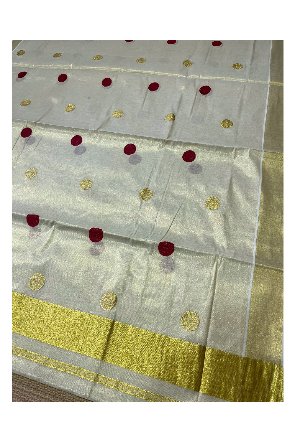 Kerala Tissue Kasavu Saree with Maroon Polka Woven Designs