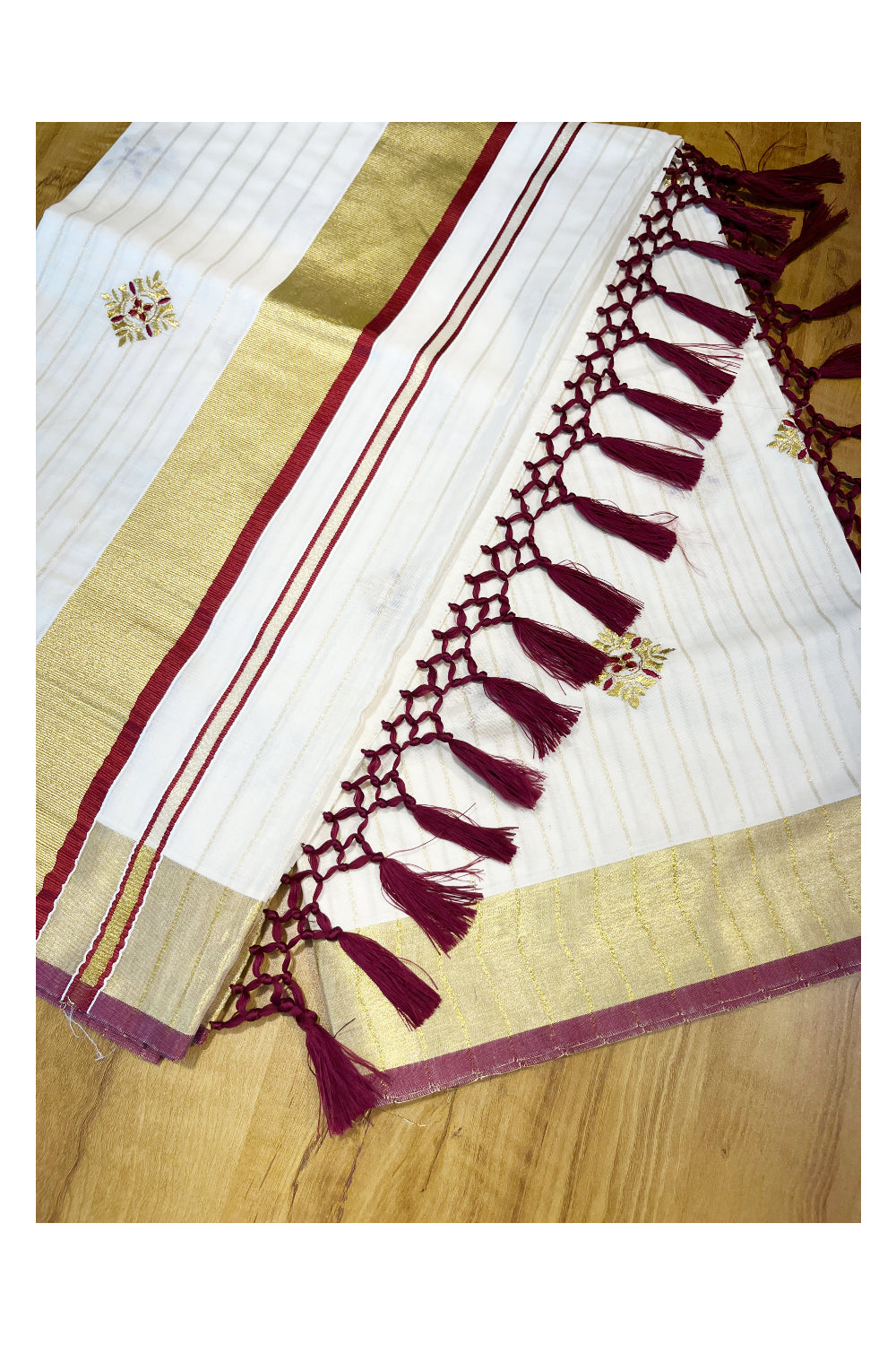 Kerala Cotton Kasavu Lines Saree with Maroon and Golden Floral Embroidery Work