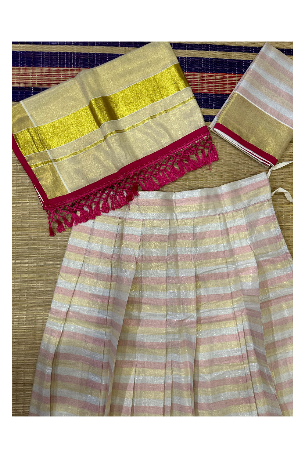 Semi Stitched Dhavani Set with Pink and Kasavu Lines Design Pavada and Blouse Piece