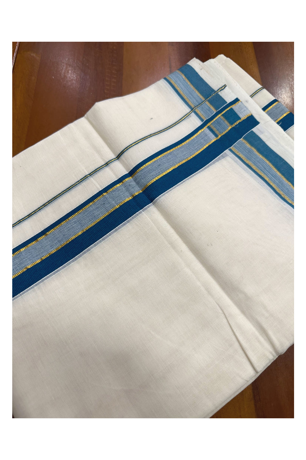 Southloom Premium Handloom Mundu with Teal Green and Kasavu Kara (Onam Mundu 2023)