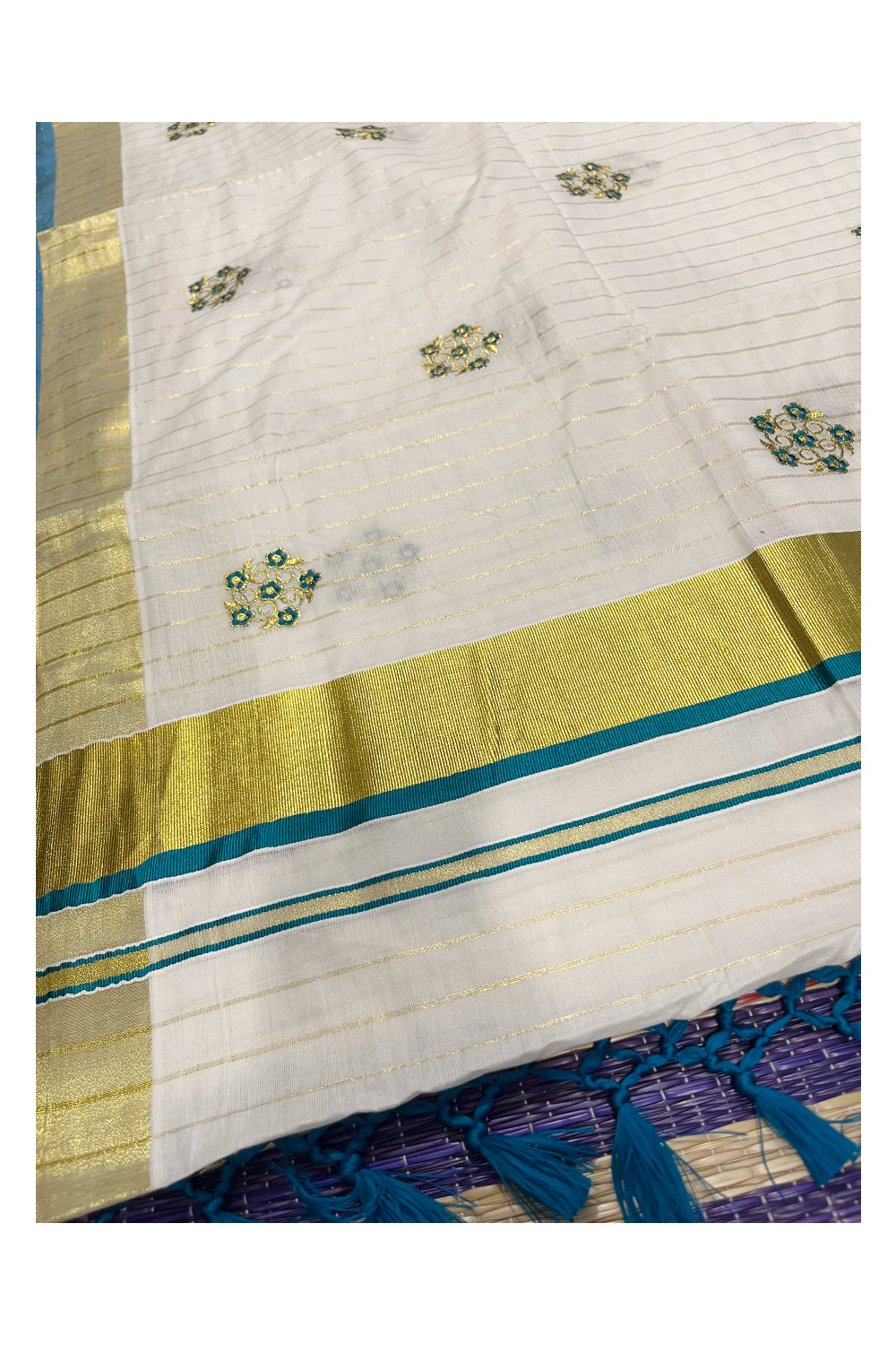 Kerala Cotton Kasavu Lines Saree with Peacock Green and Golden Floral Embroidery Work