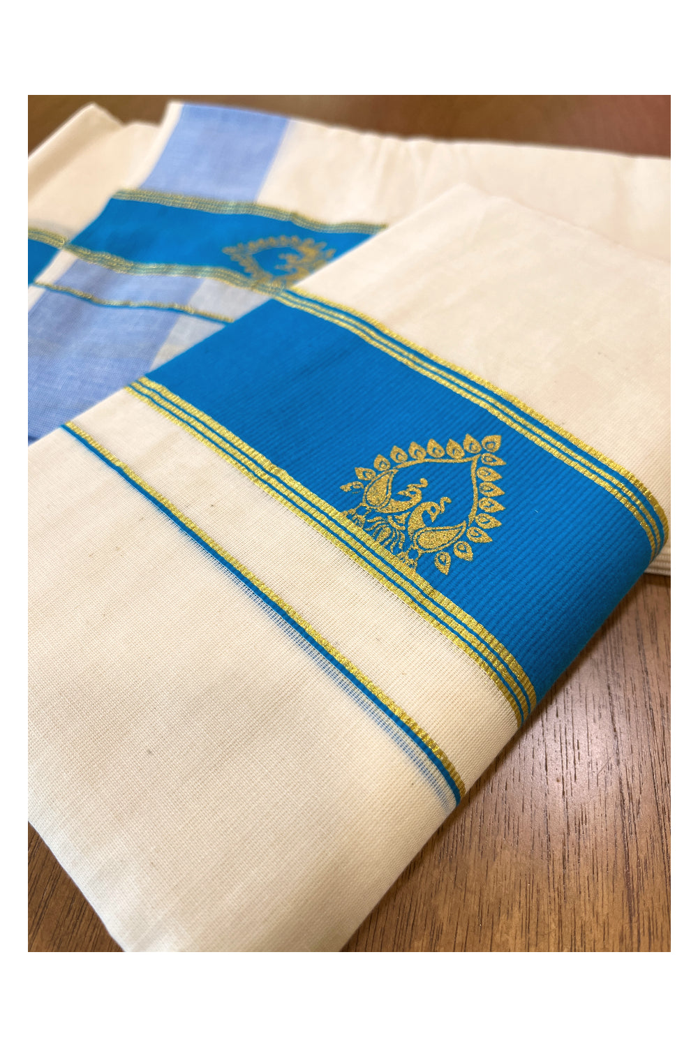 Cotton Single Set Mundu (Mundu Neriyathum) with Golden Block Prints on Light Blue Border