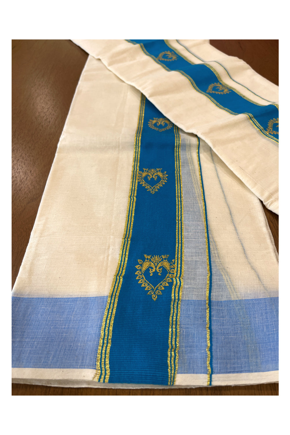 Cotton Single Set Mundu (Mundu Neriyathum) with Golden Block Prints on Light Blue Border